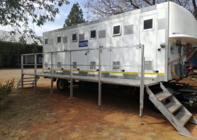 Mobi-Shower portable shower trailers set up at an outdoor event in South Africa