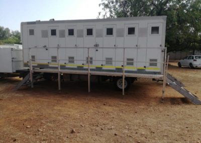 Mobi-Shower portable shower trailers set up at an outdoor event in South Africa