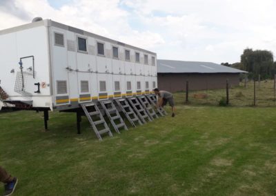 Mobi-Shower portable shower trailers set up at an outdoor event in South Africa