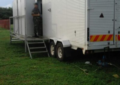 Mobi-Shower portable shower trailers set up at an outdoor event in South Africa
