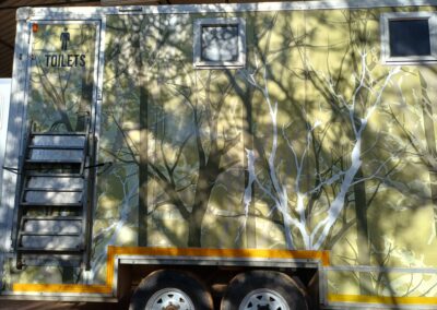 Mobi-Shower portable shower trailers set up at an outdoor event in South Africa. Portable showers and toilet hire services.